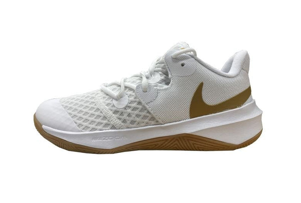 white nike shoes with gold check